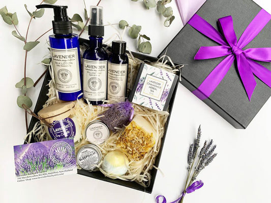 Luxury Pampering Gifts for Women featuring essential oil scented sleep aids, herbal tea, handmade soap, massage oil, body lotion products from NZ lavender farm