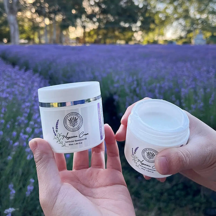 Lavender Magnesium Sleep Cream face moisturiser with blooming lavender on our New Zealand farm