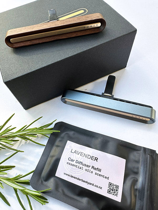 Lavender Eco-Friendly Car Diffuser: walnut wood and grey clip-on vent diffusers with a lavender refill pack