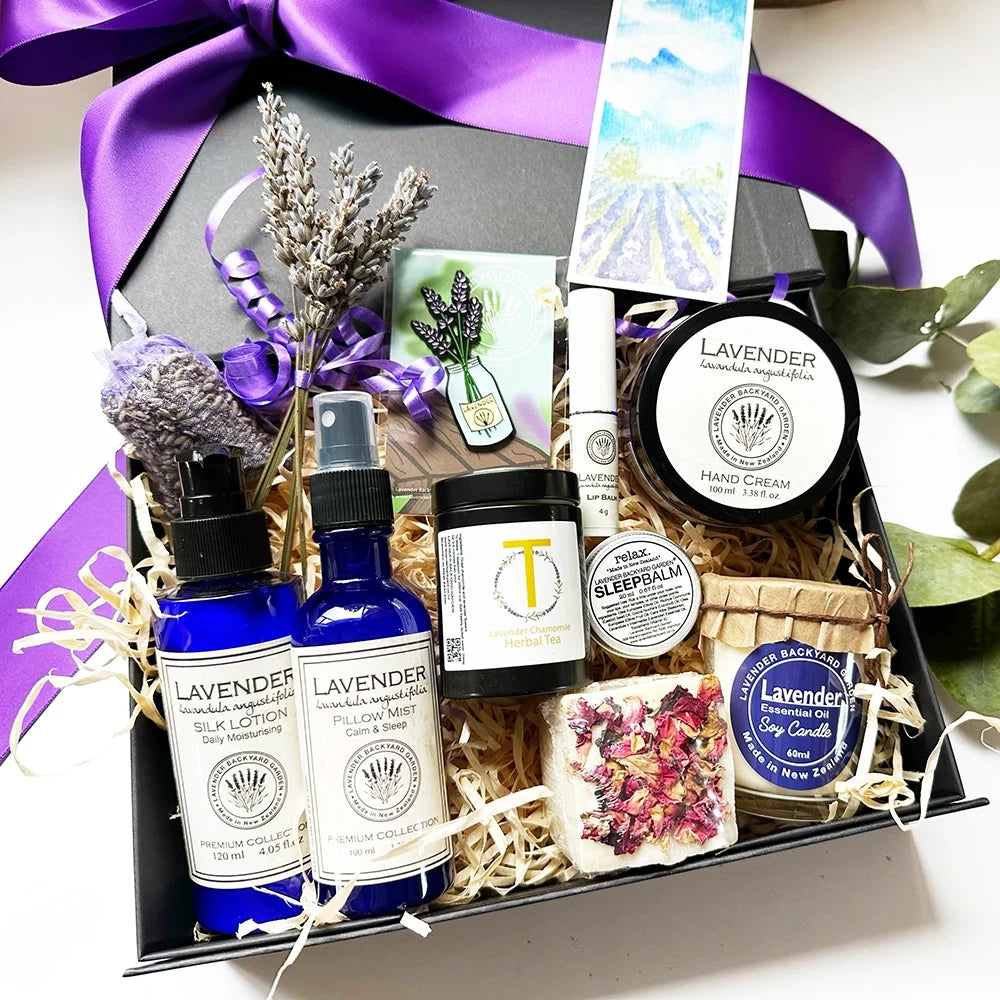 Luxury Lavender Pampering Gift Set for Women – includes soy candle, pillow mist, hand cream, silk lotion, herbal tea, lip balm, soap, sleep balm, lavender bookmark, magnet, and dried flower