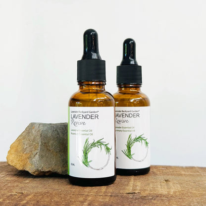 Two bottles of Lavender & Rosemary Scalp Serum by Lavender Backyard Garden