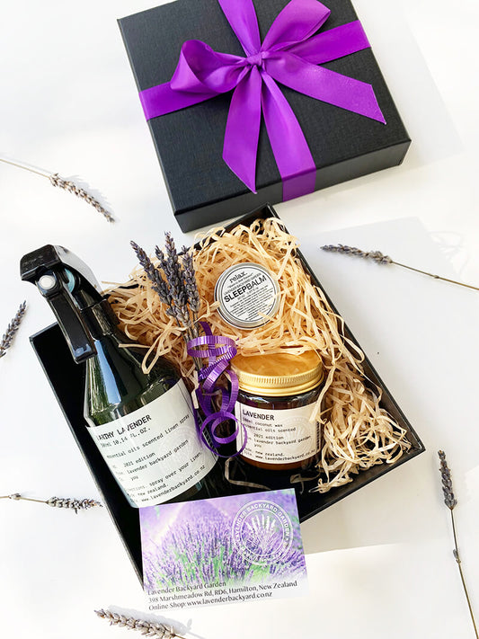 Perfect Bedtime Sleepwell Gift Basket featuring linen spray, sleep balm and coconut candle scented by lavender essential oil from NZ lavender farm